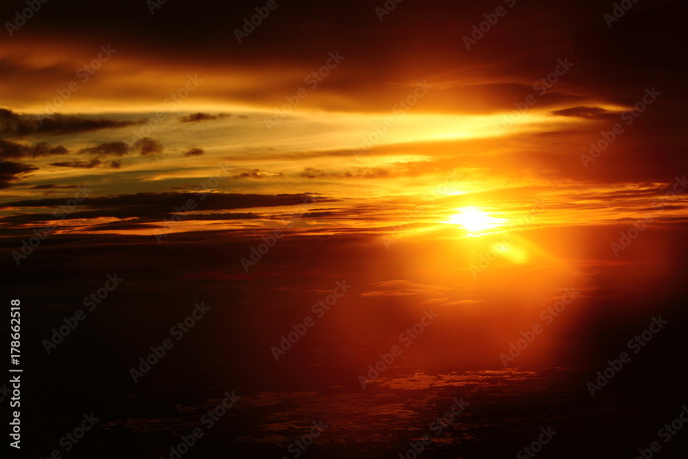 Wall mural sunset white cloud sky at high level attitude, view from window airplane