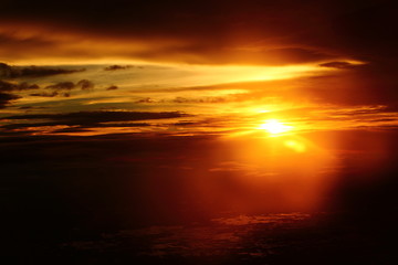 Fototapeta na wymiar Sunset White Cloud sky at high level attitude, view from window airplane