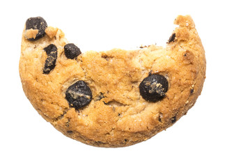 Close up of an half eaten cookie with crumb against a white background
