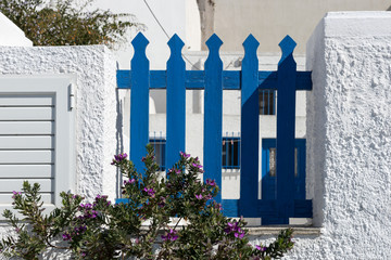 Small traditional blue fence in Oia on Santorini island, Greece