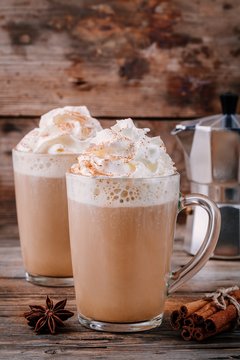 Pumpkin spice latte with whipped cream and cinnamon