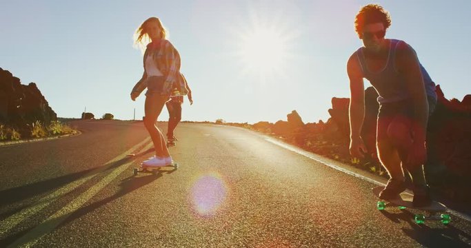 Friends Skateboarding at Sunset