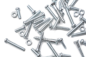Macro Of A Medium Size Collection Of Iron Screws And Bolts In A Whitebox