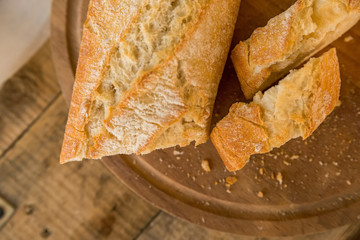 Cut baguete on cutting board