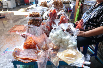 Local vendor sell Dried sweeten pork, fish, shrimp and salted egg in packaging at Nang Loeng...