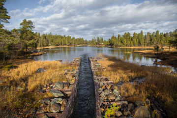 A beautiful autumn scenery of a historic water channel for transporting timber between lakes....