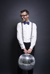 Man with disco ball posing © gpointstudio