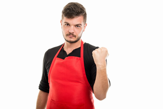 Male Supermarket Employer Holding Fist Looking Mad