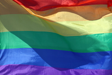 The rainbow flag - LGBT symbol - for gay, lesbian, bisexual or transgender relationship, love or sexuality