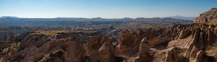 Fototapeta na wymiar Panorama Capadocia landscape with weathered rock towers
