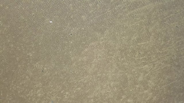 Wadden sea Unesco national park Denmark &ndash; 4K Aerial top down view of the water reflections