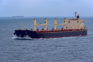 Front view of bulk carrier vessel.