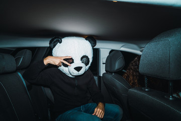 Man in panda mask