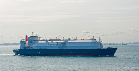 LNG tanker is passing by Singapore Strait.