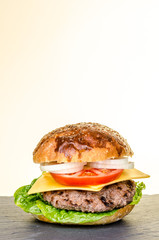 burger with cheese and vegetables