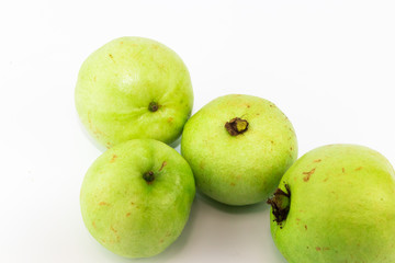 Green fresh sweet guava on white background