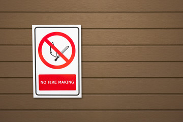 No Fire signs ON WOOD no smoking in city