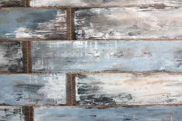 Background of worn blue boards, joints on the left