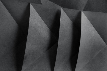 Geometric shapes of paper, grey background