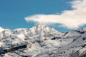 the top of the mountain with snow-covered Alps. beautiful winter mountain landscape
