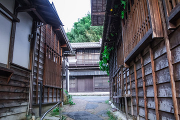 Fototapeta na wymiar Kiso valley is the old town or Japanese traditional wooden buildings for the travelers walking at historic old street in Narai-juku , Nagano Prefecture, JAPAN.