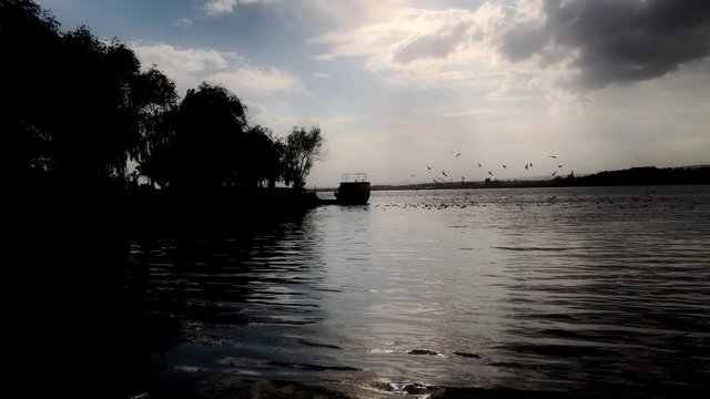 "On a beautiful day, colorful skies and sandals on the water, birds, nature cloud love and scenery perfect view being happy''