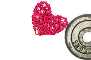 heart shape rattan  and a weight plate