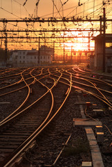 Fototapeta na wymiar Empty railroad tracks of Gare de Lyon-Perrache during sunrise. Lyon, France.