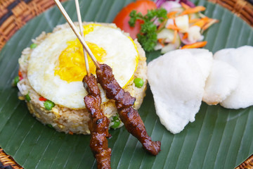 Fried rice, egg and meat skewers