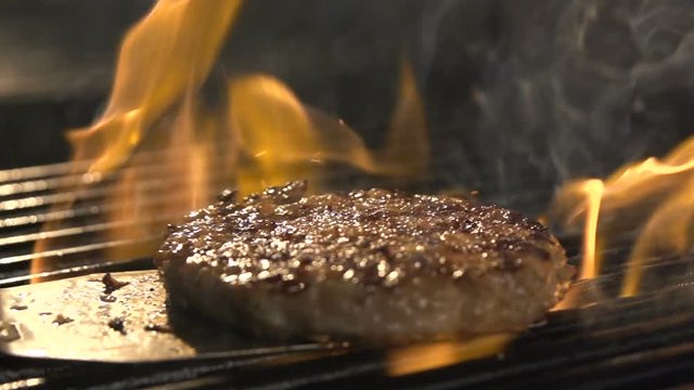 Sirloin aged prime rare roast isolated grilling pork filet with stripes slow motion. Close up blurred concept of cooked organic healthy very satisfying protein tasty dinner in casual bar or cafe