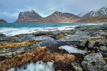 Naklejka na ściany i meble Rocky coast of fjord in Norway