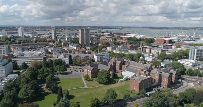 Aerial panning view of the bay and the harbour of Portsmouth, Southern England