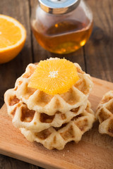 Traditional Belgium waffles and orange

