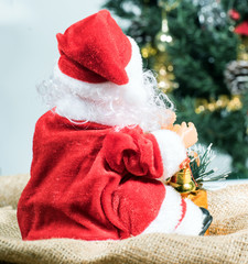 Behind the Santa Claus and Christmas tree background.Christmas decoration.