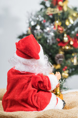 Behind the Santa Claus and Christmas tree background.Christmas decoration.