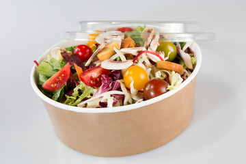 Close up of take away bowl with fast food salad
