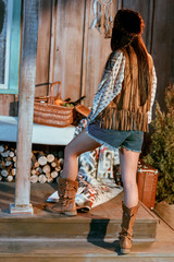 Obraz premium woman in boho style posing in house