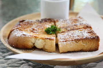 French toast with icing on top.