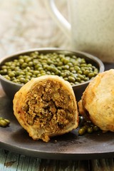 Sukhiyan - Deep fried Kerala snack with Mung beans filling, selective focus