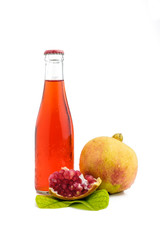 glass of pomegranate juice and pomegranate fruit put on wood tray on white background with clipping path