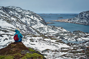 Woman tourist on Lofoten islands, Norway