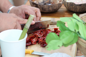 Thai traditional cooking, dried chilli cut slide on wooden chopping board.