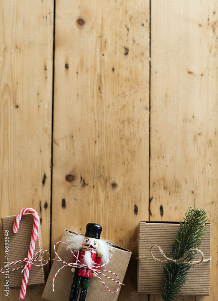 Wall mural christmas present wrapped boxes on a wooden background