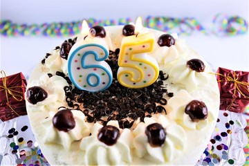 An image of a birthday cake with candle - 65