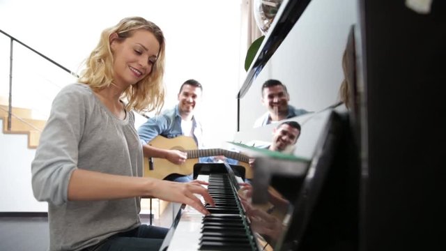 Young friends playing music