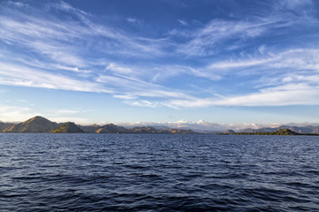 Early morning blue waters and sky off the coast of Rinca Island in the Komodo National Park.