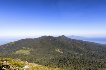 View of mountains westward near the town of Maumere from Mount Egon on the island of East Nusa Tenggara in Indonesia.