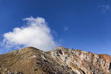 Sulphuric clouds emmited from the caldera near the summit of Mount Egon.