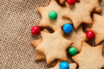 Christmas or new year gingerbread cookies with colour candies