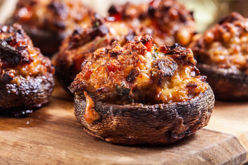 Baked champignon caps stuffed with minced meat